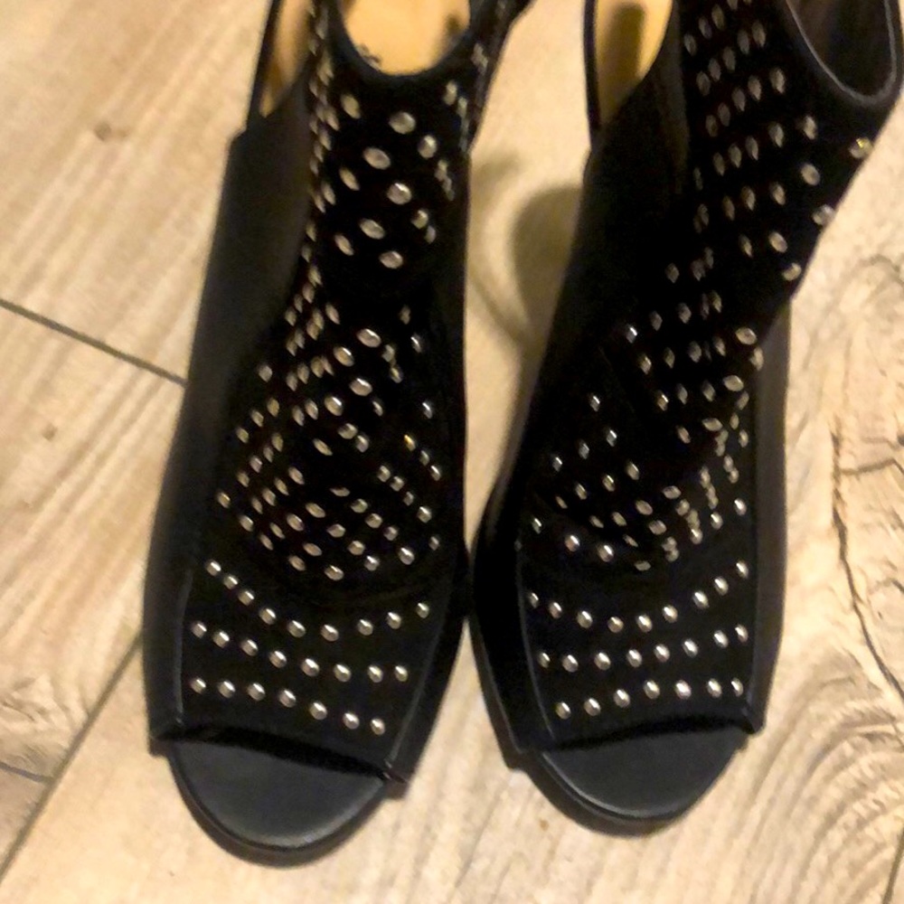 Black with silver studs, heeled open toed boot